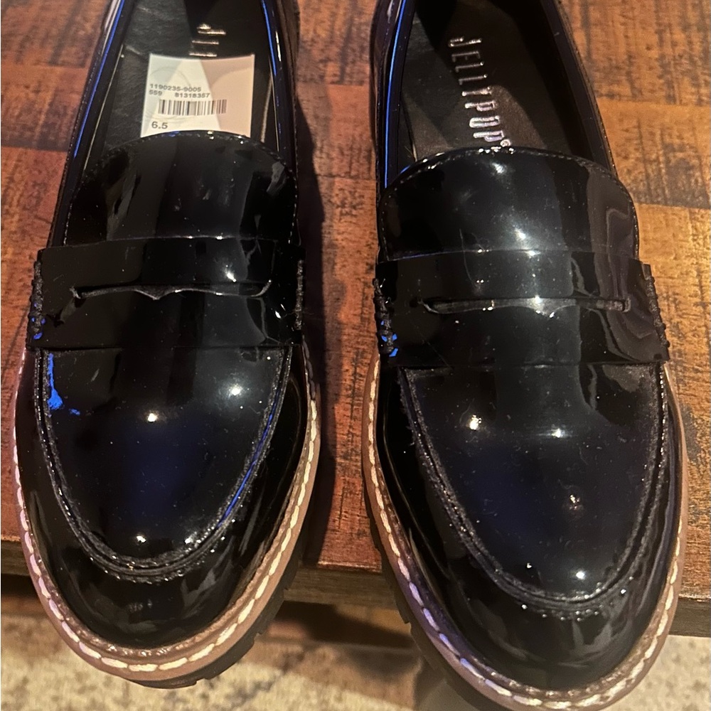 Black Loafers by Jellypop 
New.